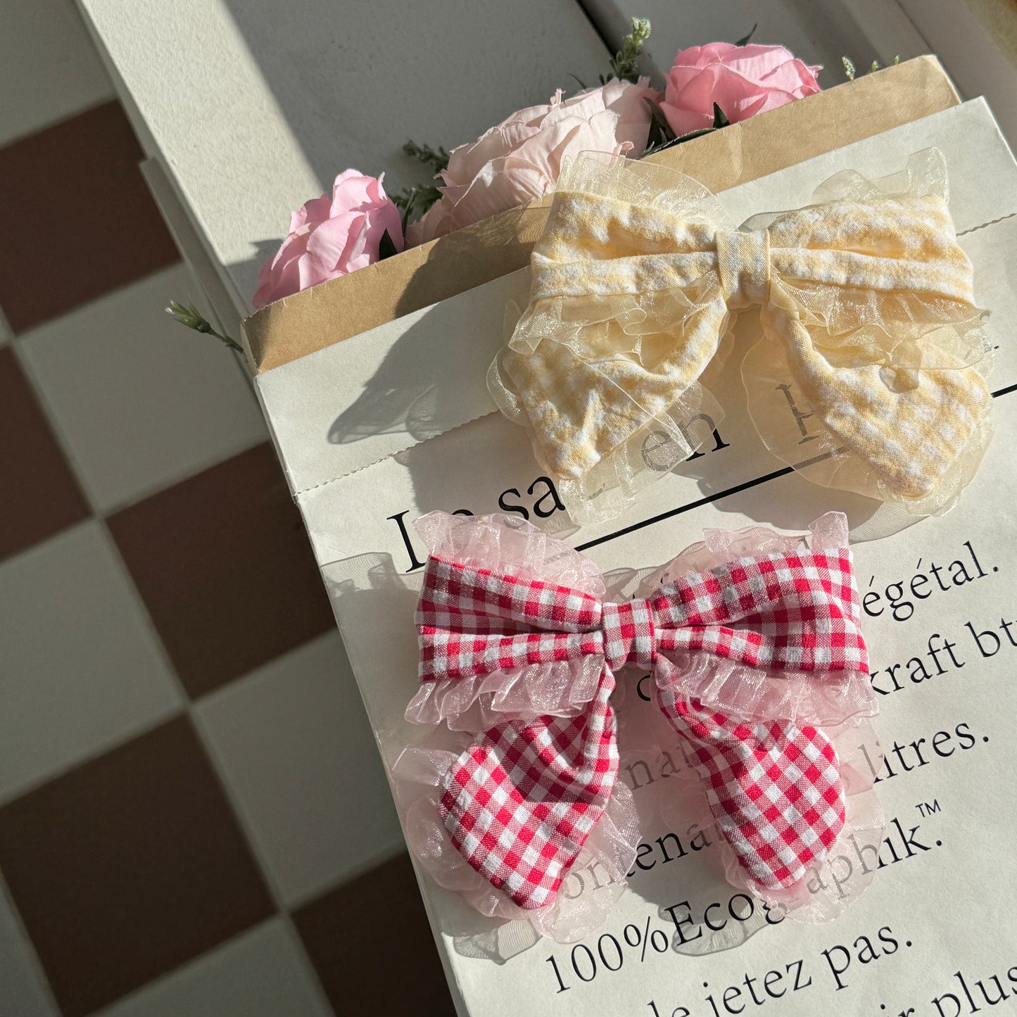 Checker ribbon pin