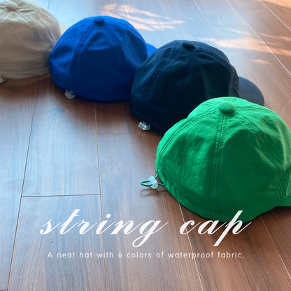 String ball cap